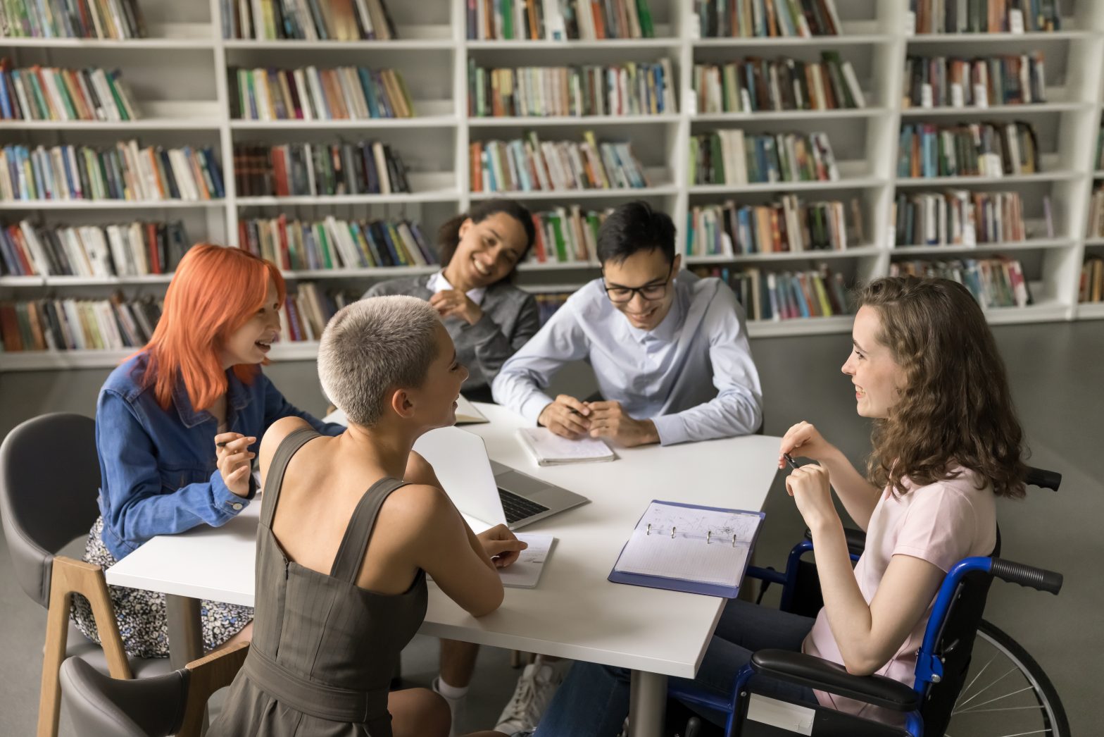 Group of students studying in library