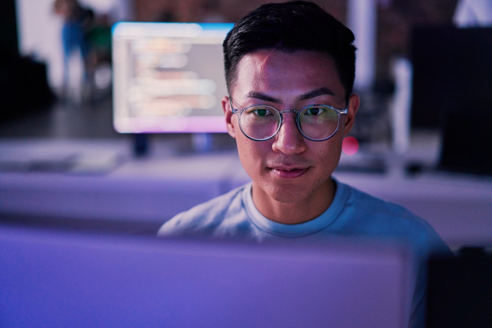 Male works on a computer